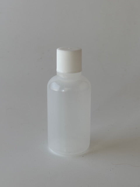 Spare Lube Bottle w/ included mixing nut